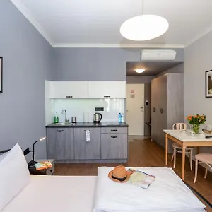 Wavelo Apartments Апартаменты